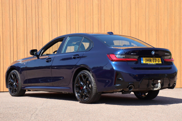 BMW 3 Serie 330E xDrive M-sport Pro Tansanitblau HUD ambiance verl. leer+vw stuurverw el.klep camera's