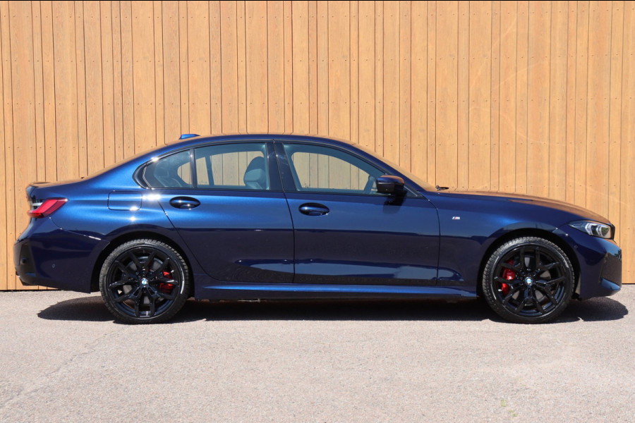 BMW 3 Serie 330E xDrive M-sport Pro Tansanitblau HUD ambiance verl. leer+vw stuurverw el.klep camera's