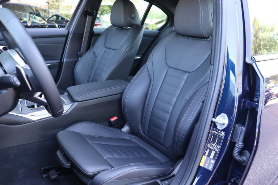 BMW 3 Serie 330E xDrive M-sport Pro Tansanitblau HUD ambiance verl. leer+vw stuurverw el.klep camera's