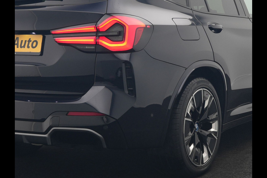 BMW iX3 M Sport High Executive 80 kWh 286pk Dealer O.H. SOH 95% | Trekhaak Af Fabriek | Panodak | Head Up | 360 Camera | Harman / Kardon | Lederen Sportstoelen Memory & Verwarmd | Keyless | Blis | Sfeerverlichting | 20"L.M | Adaptive LED |