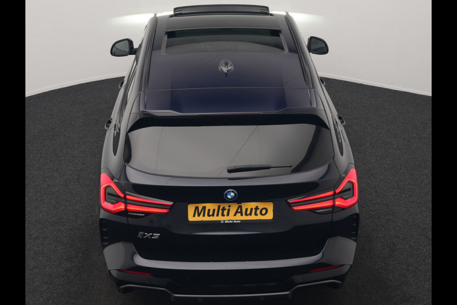 BMW iX3 M Sport High Executive 80 kWh 286pk Dealer O.H. SOH 95% | Trekhaak Af Fabriek | Panodak | Head Up | 360 Camera | Harman / Kardon | Lederen Sportstoelen Memory & Verwarmd | Keyless | Blis | Sfeerverlichting | 20"L.M | Adaptive LED |