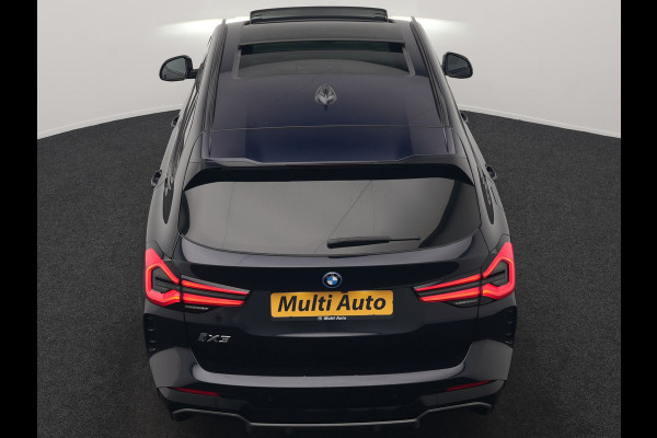 BMW iX3 M Sport High Executive 80 kWh 286pk Dealer O.H. SOH 95% | Trekhaak Af Fabriek | Panodak | Head Up | 360 Camera | Harman / Kardon | Lederen Sportstoelen Memory & Verwarmd | Keyless | Blis | Sfeerverlichting | 20"L.M | Adaptive LED |
