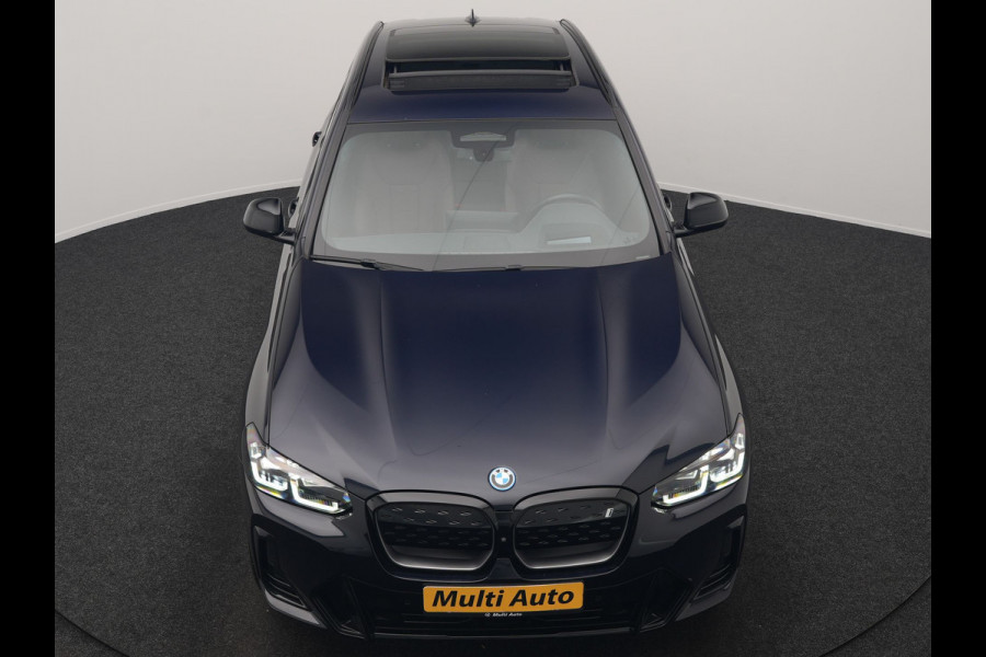 BMW iX3 M Sport High Executive 80 kWh 286pk Dealer O.H. SOH 95% | Trekhaak Af Fabriek | Panodak | Head Up | 360 Camera | Harman / Kardon | Lederen Sportstoelen Memory & Verwarmd | Keyless | Blis | Sfeerverlichting | 20"L.M | Adaptive LED |