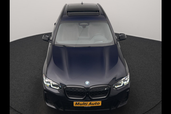 BMW iX3 M Sport High Executive 80 kWh 286pk Dealer O.H. SOH 95% | Trekhaak Af Fabriek | Panodak | Head Up | 360 Camera | Harman / Kardon | Lederen Sportstoelen Memory & Verwarmd | Keyless | Blis | Sfeerverlichting | 20"L.M | Adaptive LED |