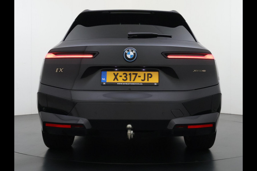 BMW iX xDrive40 Business Edition Plus 77 kWh SOH 100% | DRIVING ASSISTENT PROF. | STOEL + STUURVERWARMING EN MASSAGE| ELEKTRISCHE TREKHAAK| SKYLOUNGE | LASER|
