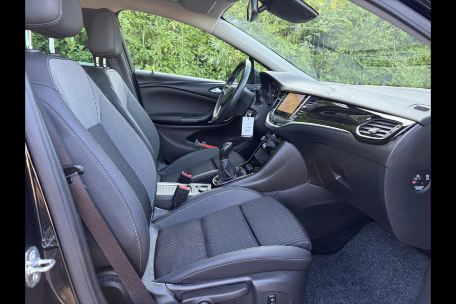 Opel Astra 1.2 Launch Elegance 2e Eigenaar,Camera,Stoelverw-Stuurverw,110pk,Navi,Carplay,Halfleder,Elekt.Stoel,6 Bak,Clima,Cruise,Lm velgen,Pdc V+A,N.A.P,Net beurt gehad,Apk tot 09-2028