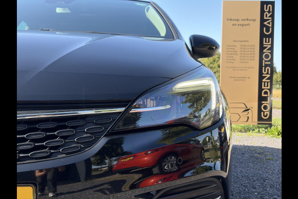 Opel Astra 1.2 Launch Elegance 2e Eigenaar,Camera,Stoelverw-Stuurverw,110pk,Navi,Carplay,Halfleder,Elekt.Stoel,6 Bak,Clima,Cruise,Lm velgen,Pdc V+A,N.A.P,Net beurt gehad,Apk tot 09-2028