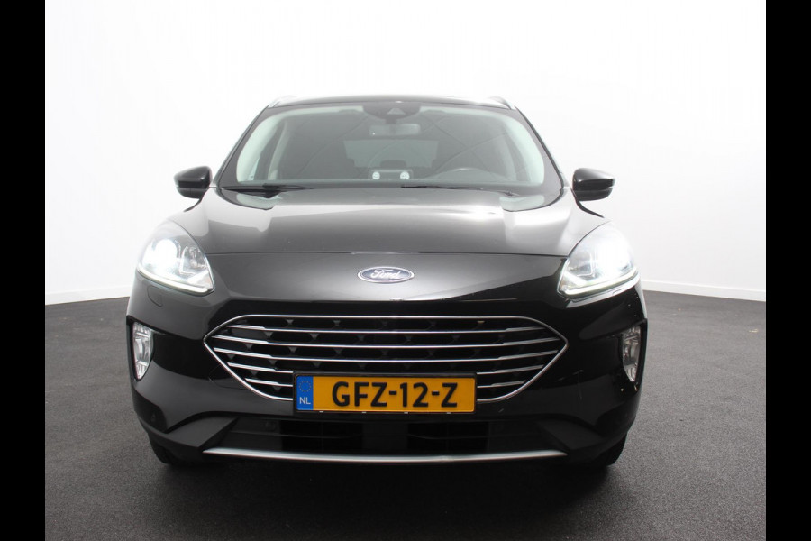 Ford Kuga 2.5 PHEV Vignale Climate control Adaptieve cruise control Led Lichtmetalen velgen Parkeersensoren Camera Stoelverwarming Stuurverwarming Navigatie Apple carplay/ Android Auto Trekhaak