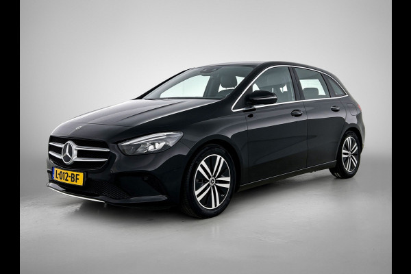 Mercedes-Benz B-Klasse 180 Business Solution Luxury Trekhaak | Parkeerpakket met achteruitrijcamera | Ledkoplampen | Sfeerverlichting | Stoelverwarming. Inclusief 24 maanden MB Certified garantie voor Europa.
