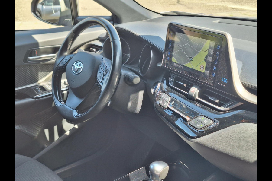 Toyota C-HR 1.8 Hybrid Style | Dodehoekherkenning, Navigatie, Parkeersensoren, Stoel + Stuurverwarming, DAB, Keyless, 18 inch
