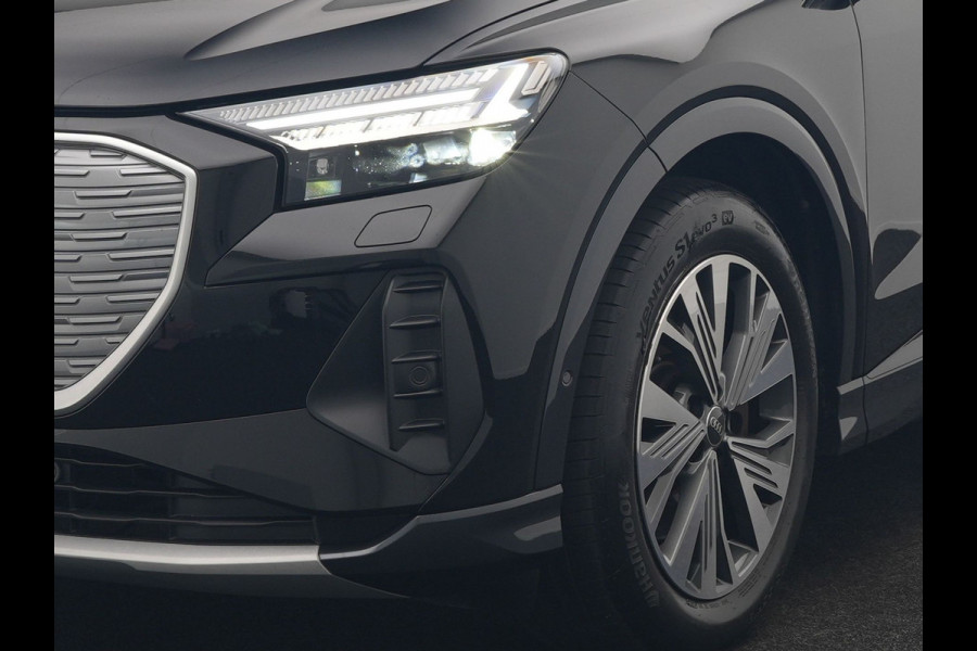 Audi Q4 e-tron 40 Edition 77 kWh 204pk Dealer O.H | Adaptive Cruise | Camera | Sportstoelen Verwarmd | BLIS | Keyless | Virtual | Navigatie | DAB | 19"L.M |