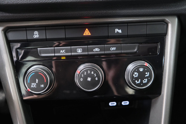 Volkswagen T-Roc 1.0 TSI Style - N.A.P. Airco, Cruise, PDC.