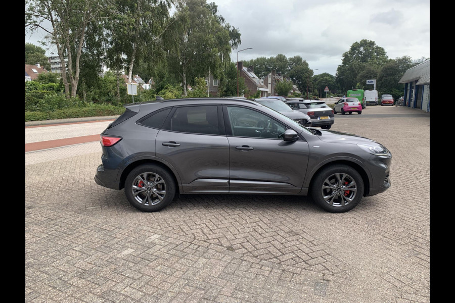 Ford Kuga 2.5 FHEV ST-Line X | 225pk | Trekhaak | Winter Pack | Adaptieve Cruise | Achteruitrijcamera | Apple Carplay & Android Auto | 1.600kg Trekgewicht