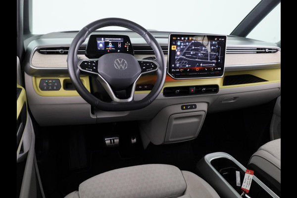 Volkswagen ID. Buzz Pro 86 kWh LWB 7p. 286 pk | SoH 96,36% |Navigatie | Panoramadak | Trekhaak (wegklapbaar) | Parkeersensoren (Park assist) | Rondomzicht camera | Elektr. schuifdeuren | Stoelverwarming |