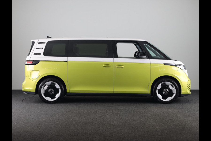 Volkswagen ID. Buzz Pro 86 kWh LWB 7p. 286 pk | SoH 96,36% |Navigatie | Panoramadak | Trekhaak (wegklapbaar) | Parkeersensoren (Park assist) | Rondomzicht camera | Elektr. schuifdeuren | Stoelverwarming |