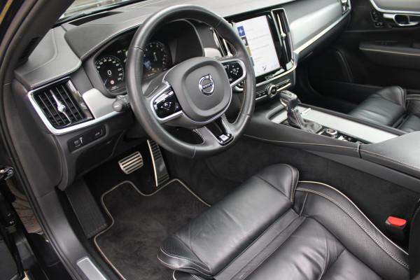 Volvo V90 2.0 T4 190PK R-Design | PANORAMISCH SCHUIF/KANTEL DAK | HARMAN KARDON PREMIUM AUDIO | ELEKTRSICHE VOORSTOELEN MET GEHEUGEN FUNCTIE | STOEL/STUUR VERWARMING | ACHTERBANK VERWARMING | HEAD-UP DISPLAY | MISTLAMPEN VOOR | KEYLESS ENTRY / START | APPLE CARPLAY | ADROID AUTO | ELEKTRISCH BEDIENBARE ACHTERKLEP | ACHTERUITRIJCAMERA | STANDKACHEL |