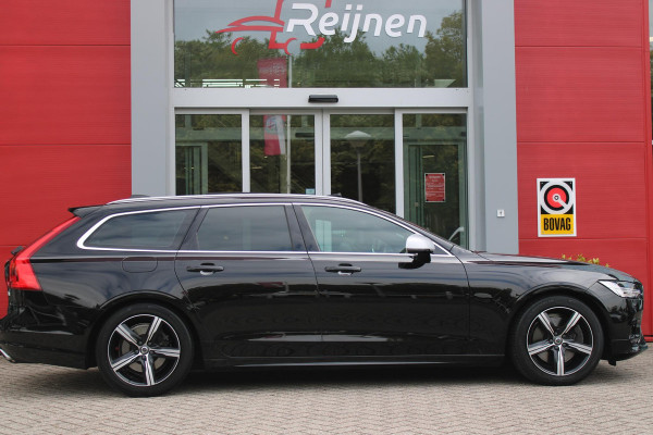 Volvo V90 2.0 T4 190PK R-Design | PANORAMISCH SCHUIF/KANTEL DAK | HARMAN KARDON PREMIUM AUDIO | ELEKTRSICHE VOORSTOELEN MET GEHEUGEN FUNCTIE | STOEL/STUUR VERWARMING | ACHTERBANK VERWARMING | HEAD-UP DISPLAY | MISTLAMPEN VOOR | KEYLESS ENTRY / START | APPLE CARPLAY | ADROID AUTO | ELEKTRISCH BEDIENBARE ACHTERKLEP | ACHTERUITRIJCAMERA | STANDKACHEL |