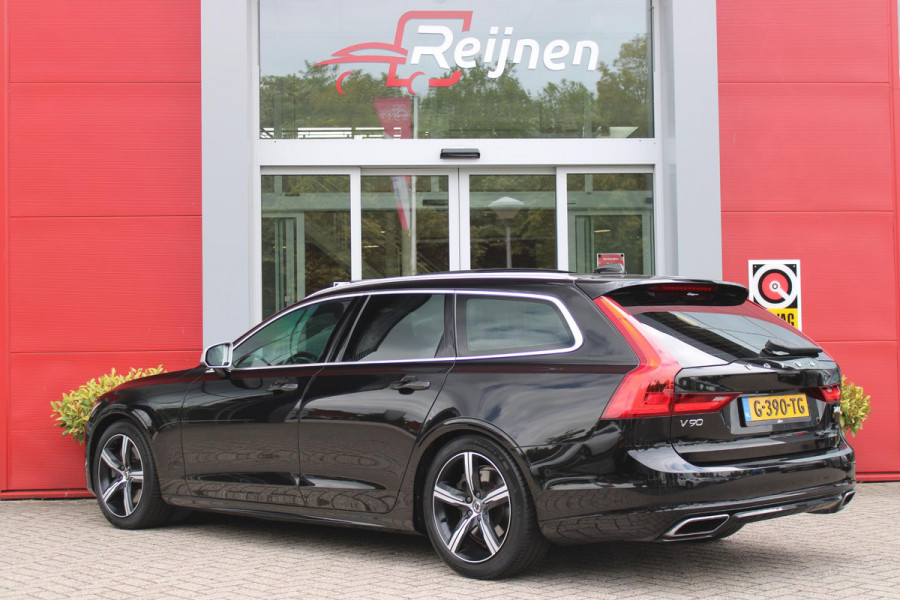 Volvo V90 2.0 T4 190PK R-Design | PANORAMISCH SCHUIF/KANTEL DAK | HARMAN KARDON PREMIUM AUDIO | ELEKTRSICHE VOORSTOELEN MET GEHEUGEN FUNCTIE | STOEL/STUUR VERWARMING | ACHTERBANK VERWARMING | HEAD-UP DISPLAY | MISTLAMPEN VOOR | KEYLESS ENTRY / START | APPLE CARPLAY | ADROID AUTO | ELEKTRISCH BEDIENBARE ACHTERKLEP | ACHTERUITRIJCAMERA | STANDKACHEL |