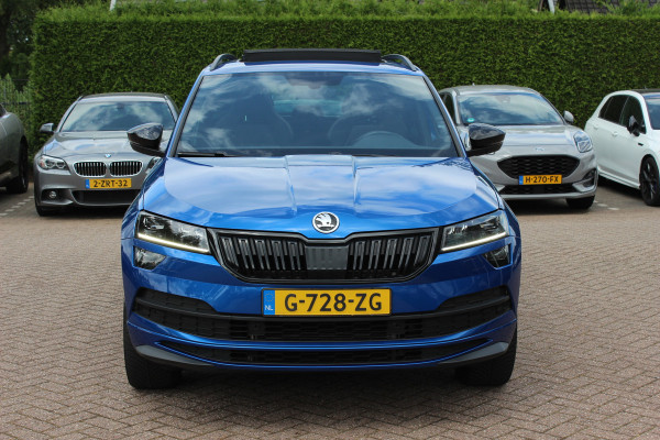 Škoda Karoq 2.0 TSI 4x4 Sportline Business / NL Auto! / Trekhaak / Panoramadak / Camera / CarPlay / Keyless / 19'' / DAB / Cruise Control