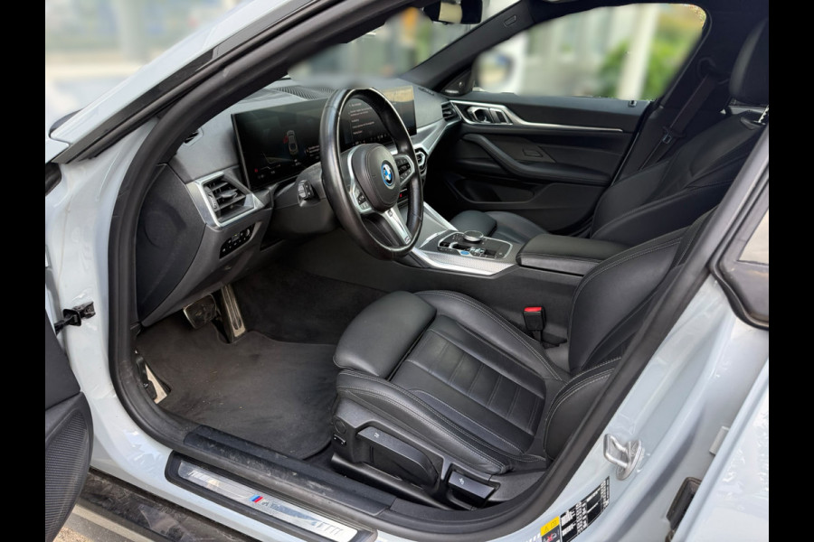 BMW i4 eDrive40 High Executive 84 kWh M Sport | Panoramadak | Stoelverwarming | Stuurverwarming | Harman Kardon | Adaptive Cruise Control | Laser LED | 360 Camera | Keyless | Navigatie | Head-Up Display |  Ambiance Verlichting |