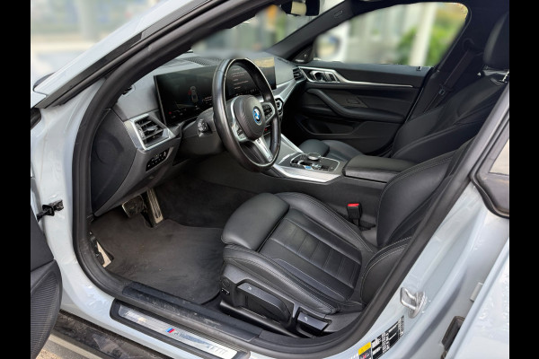 BMW i4 eDrive40 High Executive 84 kWh M Sport | Panoramadak | Stoelverwarming | Stuurverwarming | Harman Kardon | Adaptive Cruise Control | Laser LED | 360 Camera | Keyless | Navigatie | Head-Up Display |  Ambiance Verlichting |