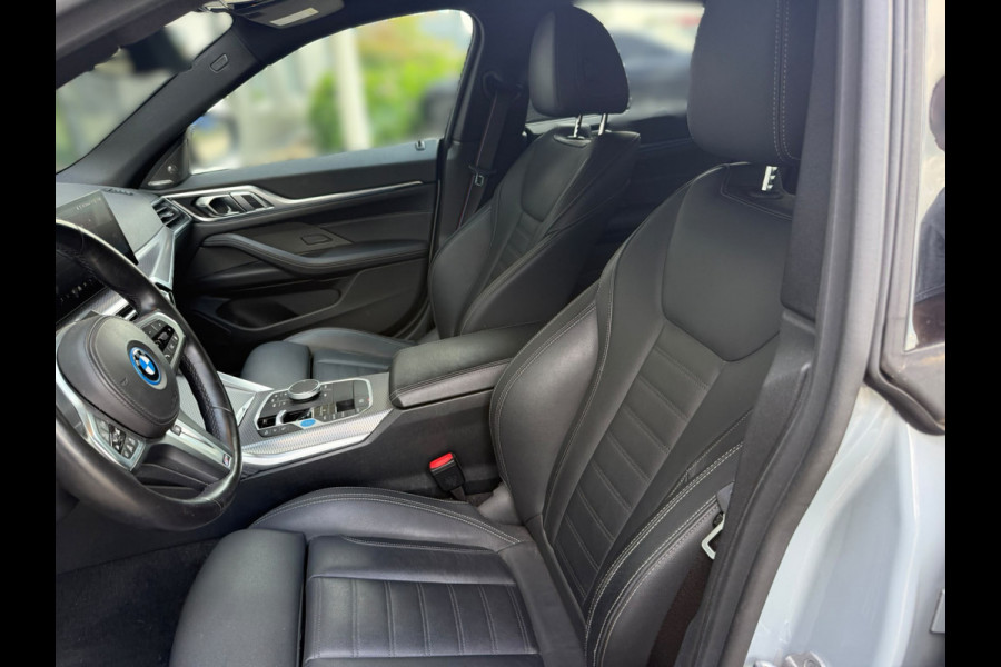 BMW i4 eDrive40 High Executive 84 kWh M Sport | Panoramadak | Stoelverwarming | Stuurverwarming | Harman Kardon | Adaptive Cruise Control | Laser LED | 360 Camera | Keyless | Navigatie | Head-Up Display |  Ambiance Verlichting |