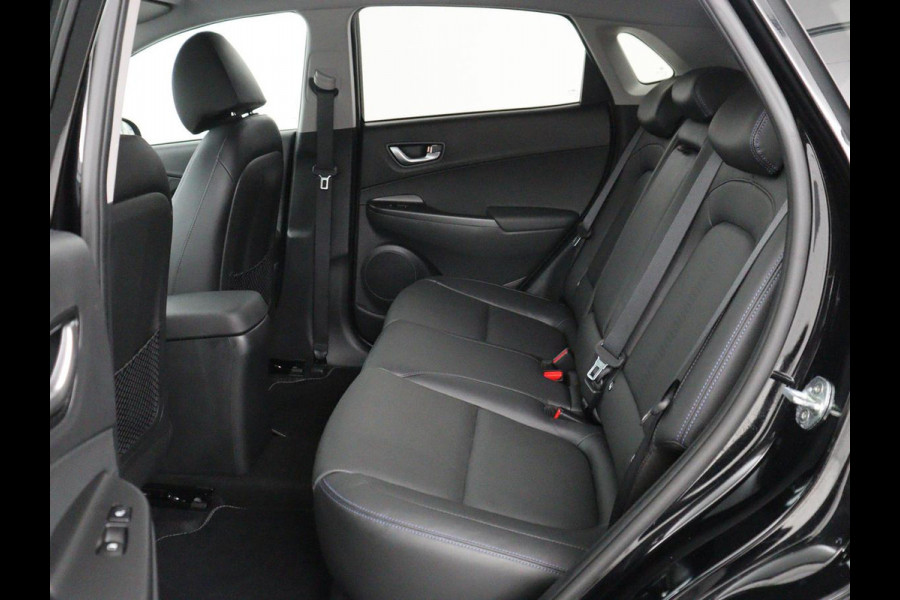 Hyundai Kona EV Premium 64 KWh | SOH 96.2% | Leder | Trekhaak | Head-up | Stoelventilatie | Stuur/stoel verwarming | Adaptive cruise | Camera | Park assist | Carplay | Dodehoek detectie | Krell sound |