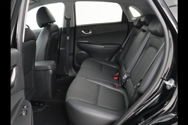 Hyundai Kona EV Premium 64 KWh | SOH 96.2% | Leder | Trekhaak | Head-up | Stoelventilatie | Stuur/stoel verwarming | Adaptive cruise | Camera | Park assist | Carplay | Dodehoek detectie | Krell sound |