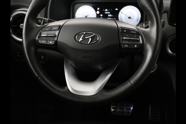 Hyundai Kona EV Premium 64 KWh | SOH 96.2% | Leder | Trekhaak | Head-up | Stoelventilatie | Stuur/stoel verwarming | Adaptive cruise | Camera | Park assist | Carplay | Dodehoek detectie | Krell sound |