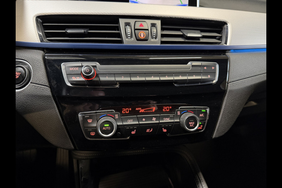 BMW X1 xDrive25e High Executive | M-pakket | Camera | Afn. trekhaak | Leder | Sfeerverlichting | Full LED