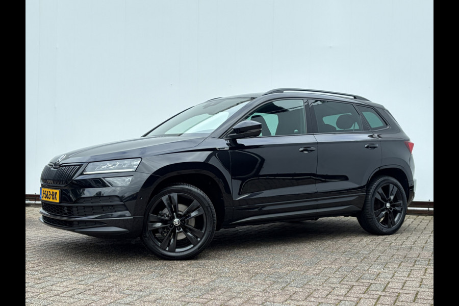 Škoda Karoq 1.5 TSI ACT Sportline Business Trekhaak Adap.Cruise Camera Stoelverw Orig.NL Voll.Onderhouden!
