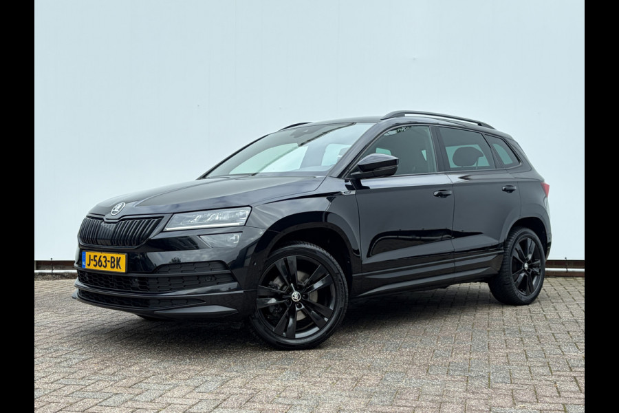 Škoda Karoq 1.5 TSI ACT Sportline Business Trekhaak Adap.Cruise Camera Stoelverw Orig.NL Voll.Onderhouden!