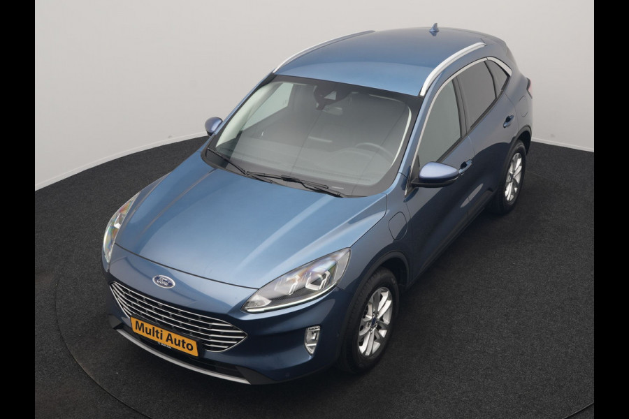 Ford Kuga 2.5 PHEV Titanium 225pk Dealer O.H | Adaptive Cruise | 360 Camera | BLIS | Stoelen & Stuur Verwarmd | Keyless | Pilot Assist | Navigatie | Apple Carplay | Virtual | DAB | 17"L.M | Plug In Hybrid |