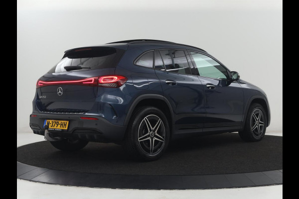 Mercedes-Benz EQA 250 Business Solution AMG 67 kWh | SOH 92.8% | Panoramadak | Head-up | Trekhaak | 360 camera | Adaptive cruise | Memory | Sfeerverlichting | Half Leder | Stoelverwarming | Carplay |
