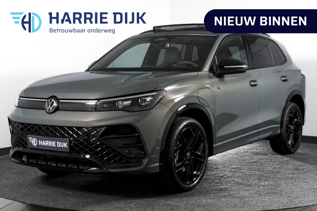 Volkswagen Tiguan 1.5 eHybrid R-Line Edition 272 PK | Black Style | 15 inch Navi | Elek. Trekhaak | IQ Light | S/K-Panodak | Dig. Cockpit | Adapt. Cruise | Stoel-+Stuurverw. | 360 Camera | NAV + App. Connect | ECC | Elek. Klep | LM 20" | 4296