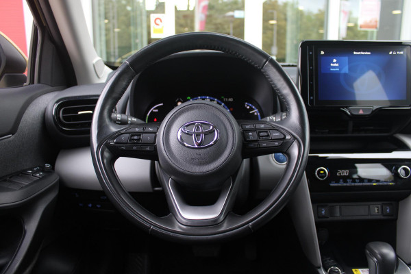 Toyota Yaris Cross 1.5 Hybrid Dynamic | KEYLESS ENTRY / START | VOORSTELEN VERWARMD | STUUR VERWARMING | HEAD-UP DISPLAY | LED KOPLAMPEN | ADAPTIVE CRUISE CONTROL | LANE ASIST |  ELEKTRISCH BEDIENBARE ACHTERKLEP | DRAADLOOS APPLE CARPLAY | ANDROID AUTO |  ACHTERUITRIJCAMERA | DRAADLOZE TELEFOONLADER | VOORRUIT VERWARMING | 16" LICHTMETALEN VELGEN |