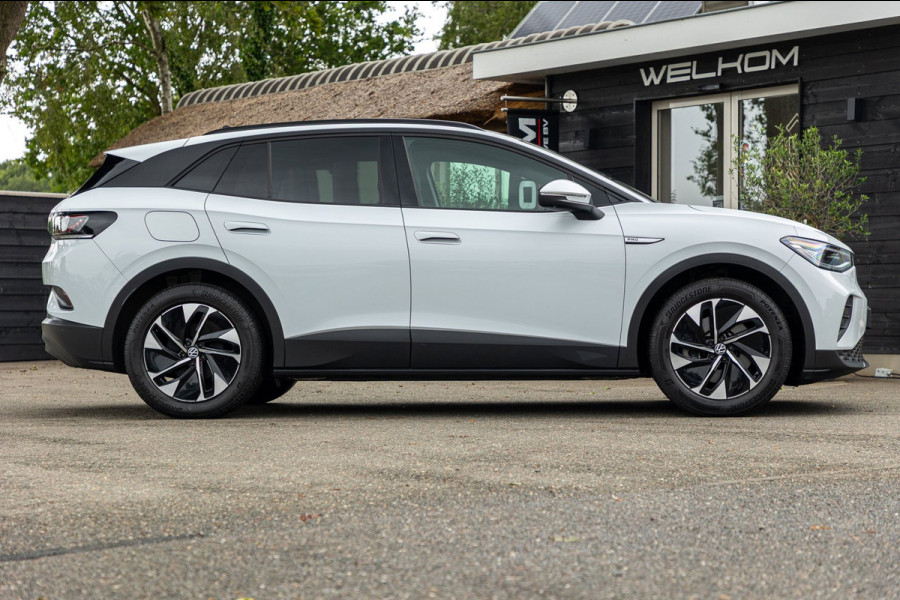 Volkswagen ID.4 Tech 77 kWh Soh 89% I Trekhaak I IQ Light I Panoramadak I Luxe interieur I ergoActive I Adaptive Cruise I BTW