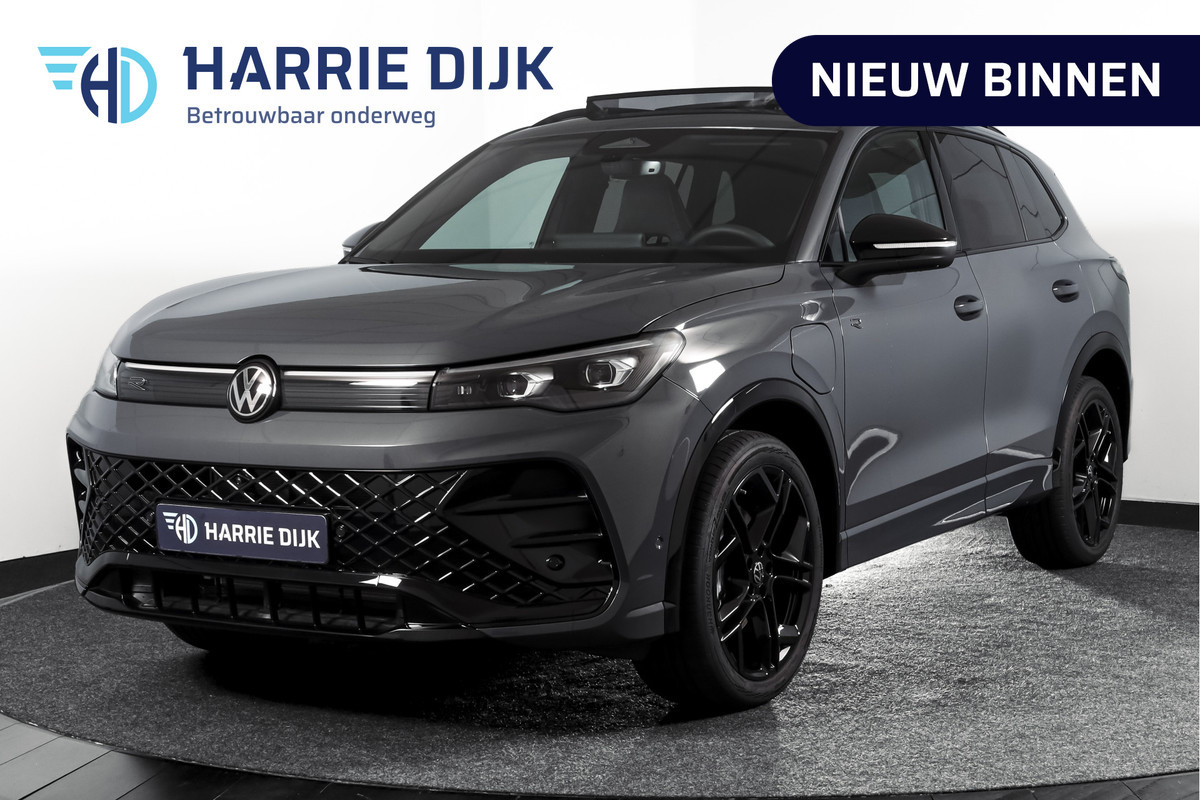 Volkswagen Tiguan 1.5 eHybrid R-Line Edition 272 PK | Black Style | 15 inch Navi | Elek. Trekhaak | IQ Light | S/K-Panodak | Dig. Cockpit | Adapt. Cruise | Stoel-+Stuurverw. | 360 Camera | NAV + App. Connect | ECC | Elek. Klep | LM 20" | 4393