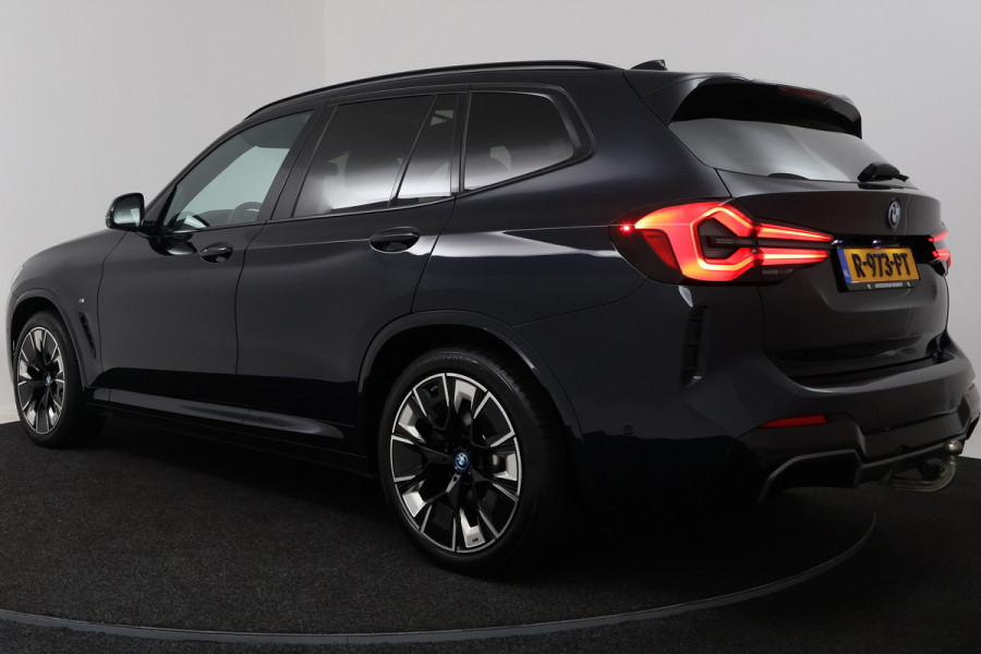 BMW iX3 High Executive 80 kWh (PANORAMADAK, TREKHAAK, H&K AUDIO, CRUISE ADAPTIEF, CAMERA, STOELVERWARMING, SFEERVERLICHTING)