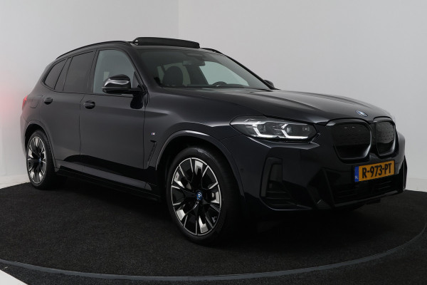 BMW iX3 High Executive 80 kWh (PANORAMADAK, TREKHAAK, H&K AUDIO, CRUISE ADAPTIEF, CAMERA, STOELVERWARMING, SFEERVERLICHTING)