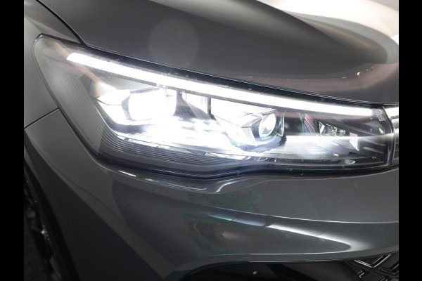 Volkswagen Tiguan 1.5 eHybrid R-Line Edition 204 pk Automaat (DSG) | Verlengde garantie | Navigatie | Panoramadak | Trekhaak (wegklapbaar) | Parkeersensoren (Park assist) | Rondomzicht camera | Black Style pakket | R-Line |