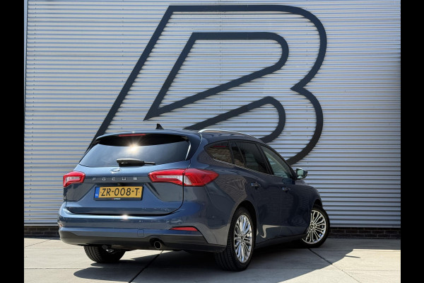 Ford FOCUS Wagon 1.0 EcoBoost Titanium Business 2e Eigenaar|Pano|Stoel+stuurverw|Adap Cruise|Carplay|HUD|Dealer Onderhouden|Camera|Clima|PDC V+A|Trekhaak|LM velgen|Navi|Elek Ramen|N.A.P.|APK tot 07-2027