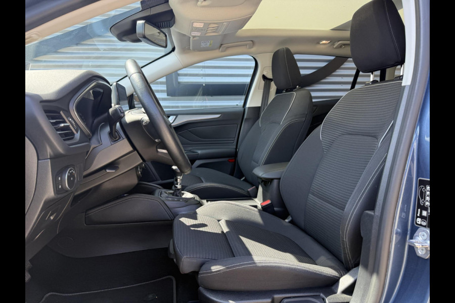 Ford FOCUS Wagon 1.0 EcoBoost Titanium Business 2e Eigenaar|Pano|Stoel+stuurverw|Adap Cruise|Carplay|HUD|Dealer Onderhouden|Camera|Clima|PDC V+A|Trekhaak|LM velgen|Navi|Elek Ramen|N.A.P.|APK tot 07-2027
