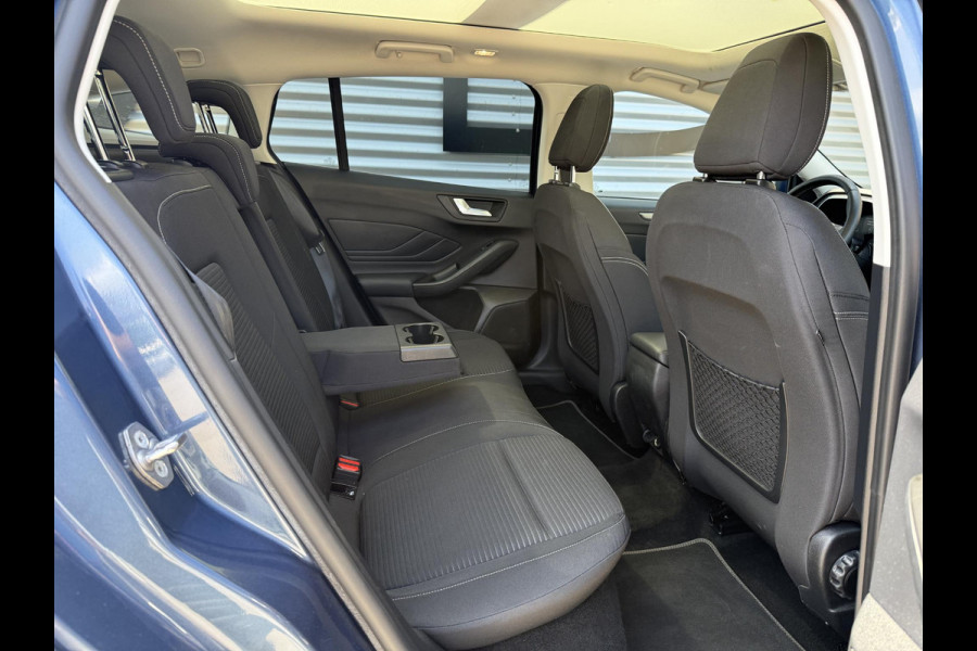 Ford FOCUS Wagon 1.0 EcoBoost Titanium Business 2e Eigenaar|Pano|Stoel+stuurverw|Adap Cruise|Carplay|HUD|Dealer Onderhouden|Camera|Clima|PDC V+A|Trekhaak|LM velgen|Navi|Elek Ramen|N.A.P.|APK tot 07-2027