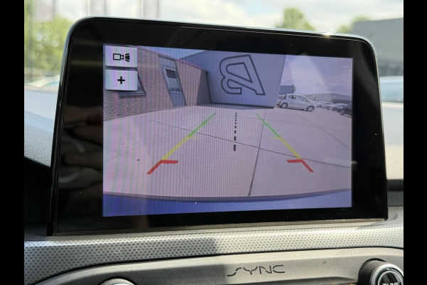 Ford FOCUS Wagon 1.0 EcoBoost Titanium Business 2e Eigenaar|Pano|Stoel+stuurverw|Adap Cruise|Carplay|HUD|Dealer Onderhouden|Camera|Clima|PDC V+A|Trekhaak|LM velgen|Navi|Elek Ramen|N.A.P.|APK tot 07-2027