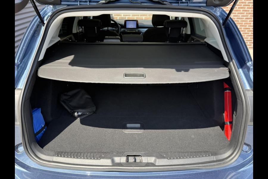 Ford FOCUS Wagon 1.0 EcoBoost Titanium Business 2e Eigenaar|Pano|Stoel+stuurverw|Adap Cruise|Carplay|HUD|Dealer Onderhouden|Camera|Clima|PDC V+A|Trekhaak|LM velgen|Navi|Elek Ramen|N.A.P.|APK tot 07-2027