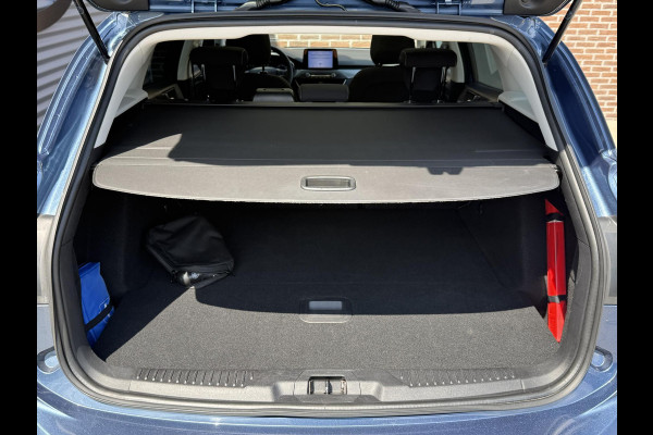 Ford FOCUS Wagon 1.0 EcoBoost Titanium Business 2e Eigenaar|Pano|Stoel+stuurverw|Adap Cruise|Carplay|HUD|Dealer Onderhouden|Camera|Clima|PDC V+A|Trekhaak|LM velgen|Navi|Elek Ramen|N.A.P.|APK tot 07-2027