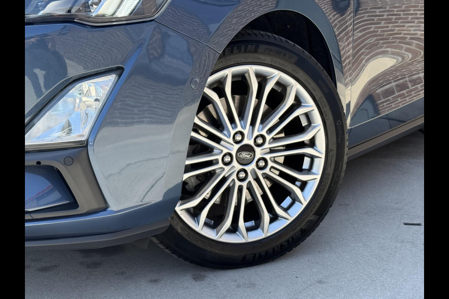 Ford FOCUS Wagon 1.0 EcoBoost Titanium Business 2e Eigenaar|Pano|Stoel+stuurverw|Adap Cruise|Carplay|HUD|Dealer Onderhouden|Camera|Clima|PDC V+A|Trekhaak|LM velgen|Navi|Elek Ramen|N.A.P.|APK tot 07-2027