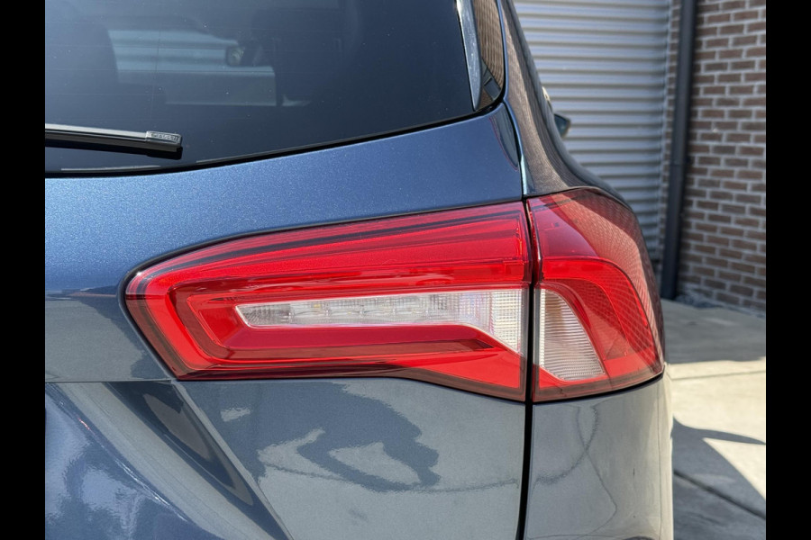 Ford FOCUS Wagon 1.0 EcoBoost Titanium Business 2e Eigenaar|Pano|Stoel+stuurverw|Adap Cruise|Carplay|HUD|Dealer Onderhouden|Camera|Clima|PDC V+A|Trekhaak|LM velgen|Navi|Elek Ramen|N.A.P.|APK tot 07-2027