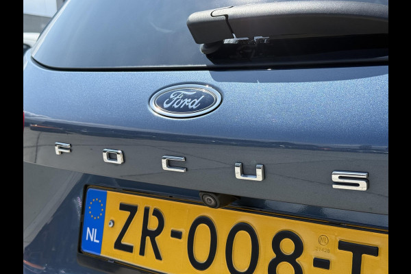Ford FOCUS Wagon 1.0 EcoBoost Titanium Business 2e Eigenaar|Pano|Stoel+stuurverw|Adap Cruise|Carplay|HUD|Dealer Onderhouden|Camera|Clima|PDC V+A|Trekhaak|LM velgen|Navi|Elek Ramen|N.A.P.|APK tot 07-2027